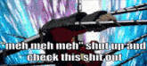 a man is laying in a wrestling ring with the words `` i 'm meh meh shut up and check this shit out ''