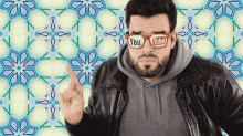 a man wearing glasses that say youtube on them