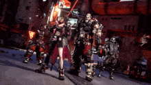 a group of soldiers are standing in front of a building with a neon sign that says ' a '