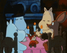 a group of cartoon characters sit at a table with candles