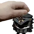a hand is touching a cartoon character with a hat on .