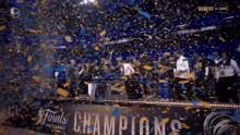 the word champions is on a sign in a sports arena