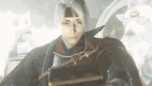 a man in a video game is holding a book and a sword .