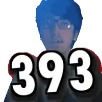a man wearing glasses is holding up the number 393 in front of his face