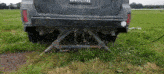a black car with a license plate that says 7j400ui