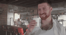 Sipping Awkward GIF - Sipping Awkward Nothing Happened GIFs