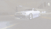 a car with a sticker on the side that says ' nsr ' on it