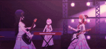 three anime girls are playing guitars and keyboards on a stage