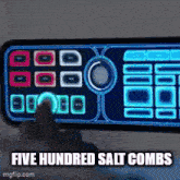 a person is pressing a button on a remote control that says five hundred salt combs on it