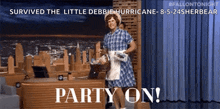 a man in a plaid dress is standing in front of a desk with the words party on on it