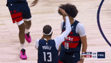 a basketball player with the number 13 on their jersey