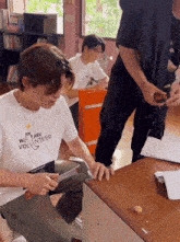 a man wearing a t-shirt that says i 'm a volunteer