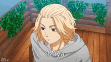 a cartoon character with the name miya on his chest