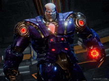 a man in a purple suit is holding a red object in his right hand