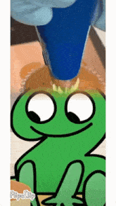 a cartoon frog is being decorated with frosting and the word flipaclip is on the bottom right