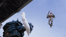 a robot is flying in the air with a sword
