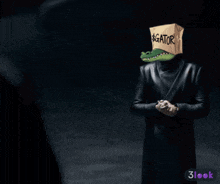 a man with a box on his head that says " gator "