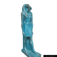 a blue statue of a man with a bird 's head and a long beak
