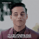 a man in a suit and plaid shirt is talking about looking sharp regardless of the occasion