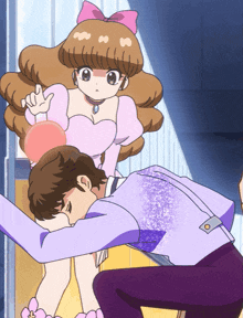 a girl in a pink dress is standing next to a boy