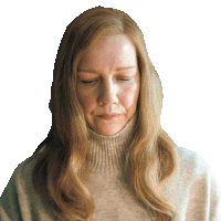 a woman with long blonde hair wearing a turtleneck sweater looks down with her eyes closed