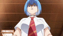 a girl with blue hair and a red tie looks at the camera