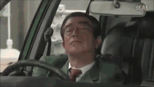 sleepy japanese taxi cab driver
