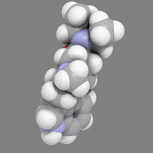 a model of a molecule with a red center