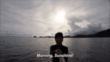 a man on a boat says morning sunshine in the water