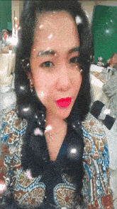 a woman with bubbles on her face is wearing a necklace