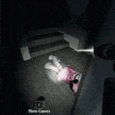 a girl in a pink dress is laying on the floor in a dark room with the word outside above her head