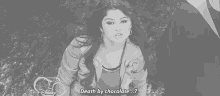 a black and white photo of a woman with the words death by chocolate
