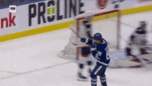 a hockey player with the number 18 on his jersey