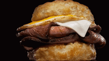 Hardees Prime Rib And Fried Egg Biscuit GIF - Hardees Prime Rib And Fried Egg Biscuit Biscuit Sandwich GIFs