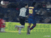 a soccer player wearing a number 10 jersey is running towards another player