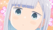 a close up of a girl 's face with blue eyes