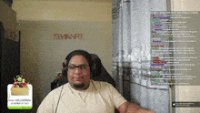 a man wearing glasses and headphones is sitting in front of a wall that says trevanne3 on it
