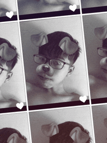 a black and white photo of a boy with dog ears on his face
