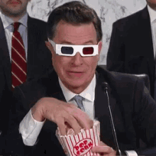 Stephen Colbert GIF - Stephen Colbert Eat GIFs