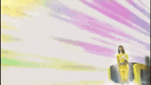 a woman in a yellow outfit is jumping in front of a yellow train with the words too 3 written below her