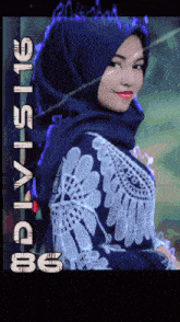 a woman wearing a blue hijab and a white shirt with the words mdlvs116 on the bottom right