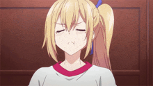 a blonde anime girl with a ponytail is making a face