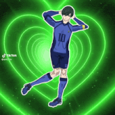 a soccer player with the number 10 on his jersey stands in front of a green heart