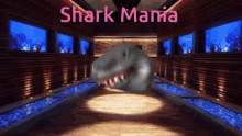 a shark in a bowling alley with the words shark mania written above it