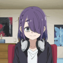 a girl with purple hair is wearing headphones and sitting in a chair