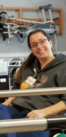 a woman wearing a sweatshirt that says los angeles on it