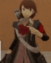 a doll with a red armband on her arm is standing in front of a wall .