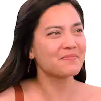 a close up of a woman 's face with long hair