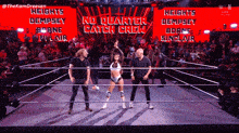 three wrestlers are in a ring with a sign that says heights dempsey catch crew
