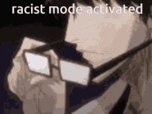 a man wearing glasses with the words racist mode activated on the bottom